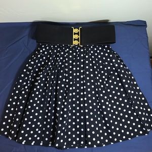 Black and white polka dot poodle mini skirt